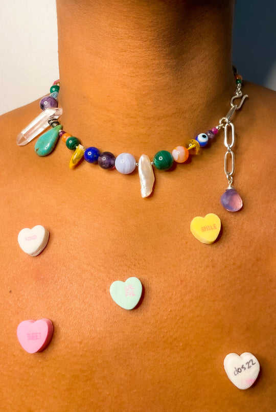 necklace with candy hearts around the neck 